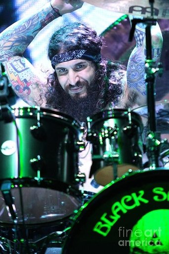 Portrait of Tommy Clufetos