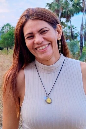 Portrait of Dênia Cruz