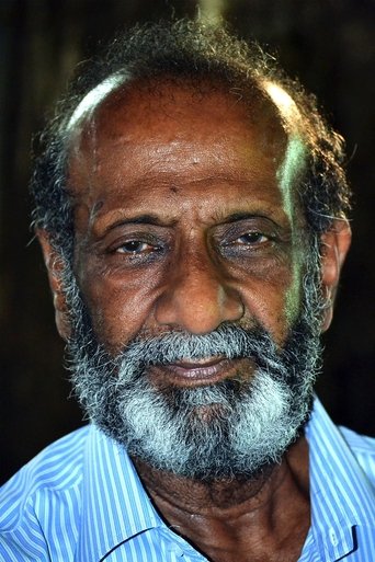 Portrait of T G Ravi