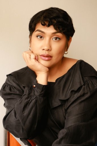 Portrait of Ellie Posadas