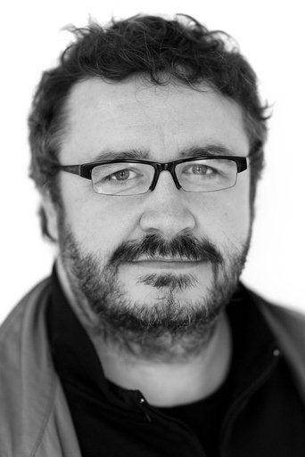 Portrait of Mark Benton