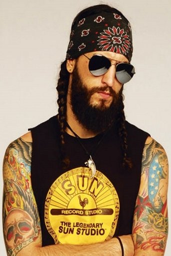Portrait of Tommy Clufetos