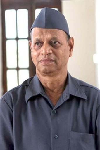 Portrait of Kishore Nandlaskar