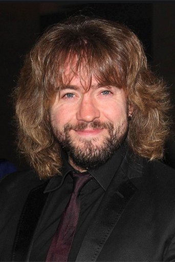 Portrait of Justin Lee Collins