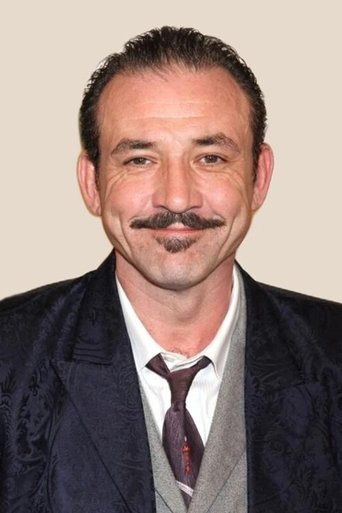 Portrait of Ritchie Coster