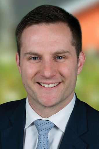 Portrait of Alex Hawke