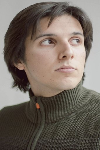 Portrait of Alan Gómez