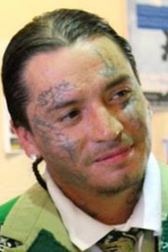 Portrait of Travis Lone Hill