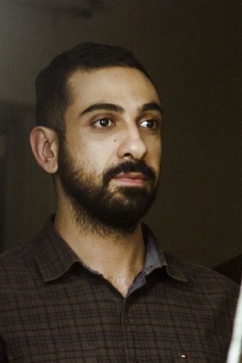 Portrait of Pouyan Fereidooni