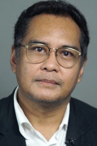 Portrait of John Arcilla