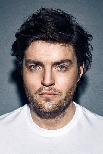 Portrait of Tom Burke