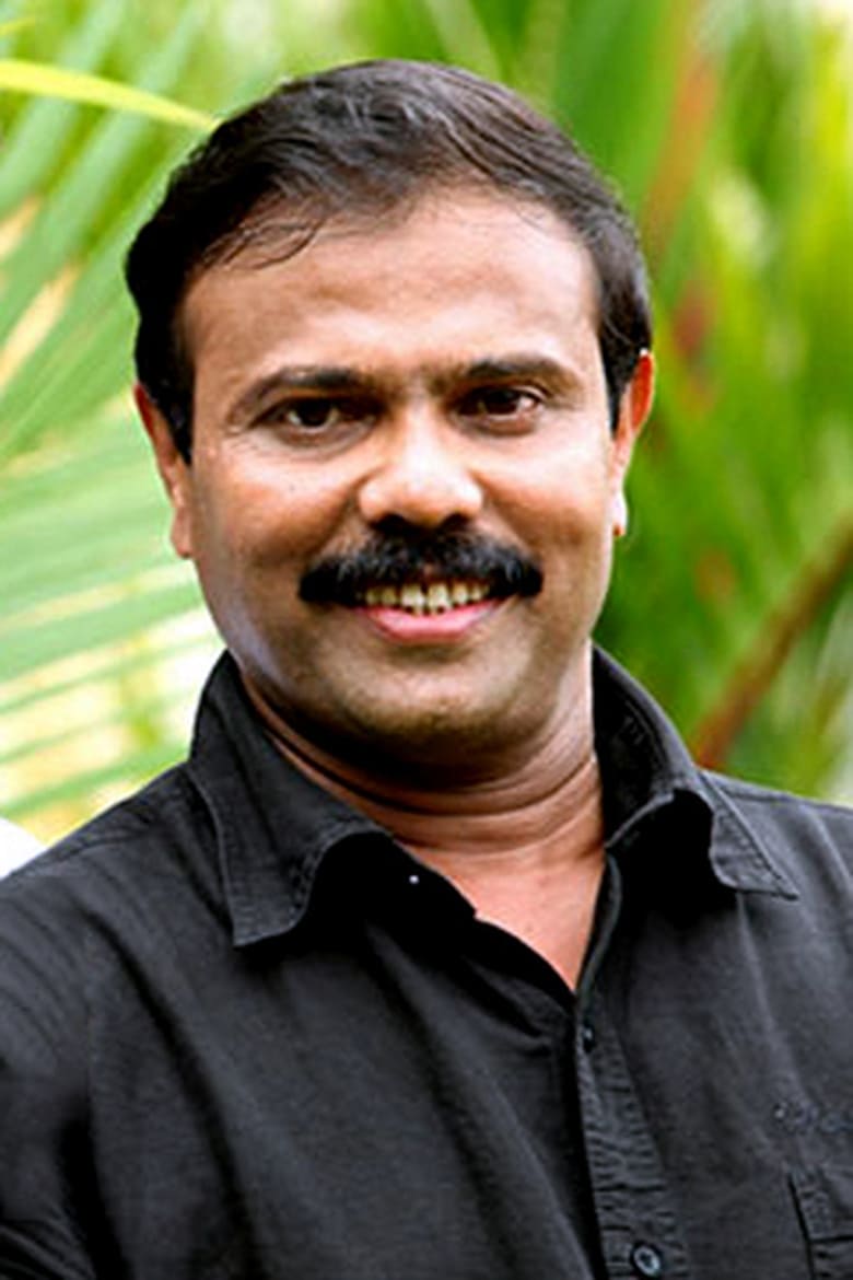 Portrait of Siby K Thomas