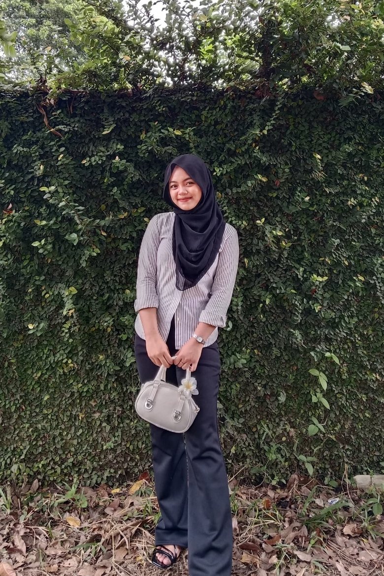 Portrait of Devi Mulyati