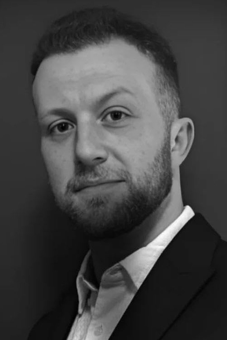 Portrait of Aaron Deakins