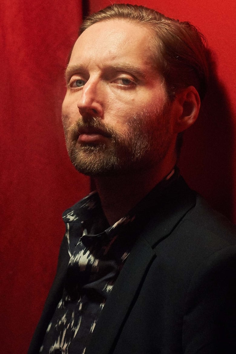 Portrait of Mark Stoermer