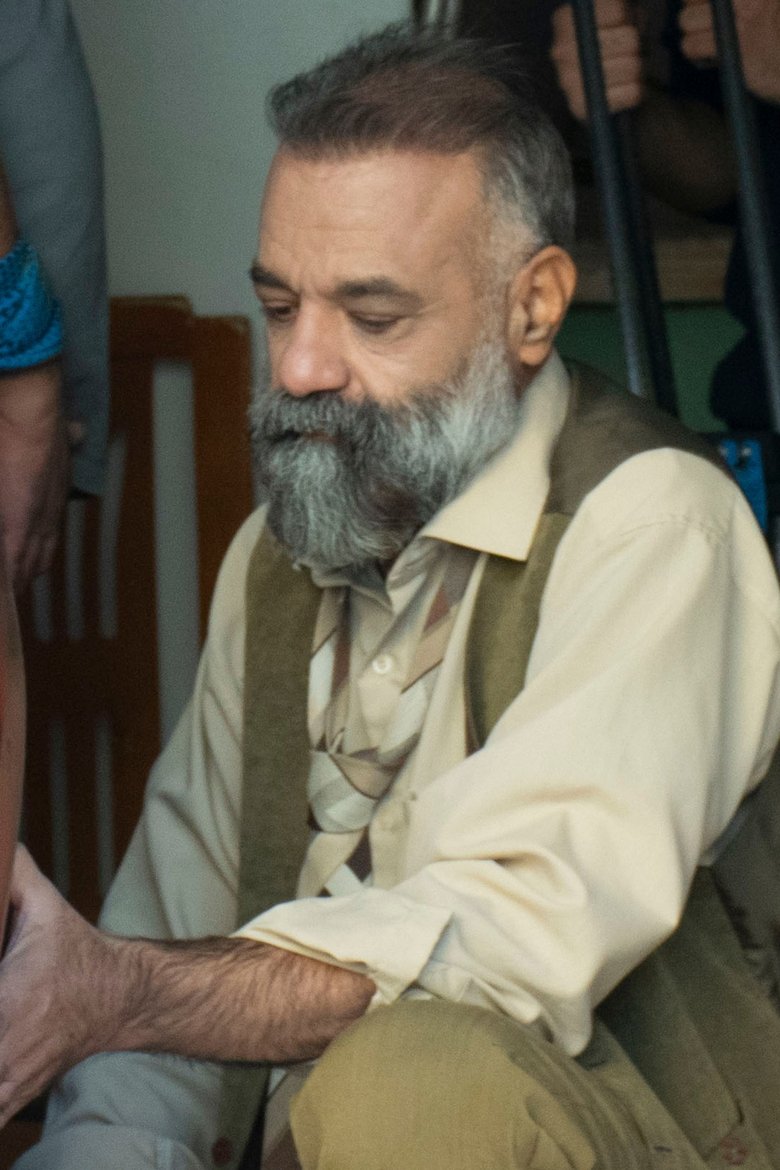 Portrait of Masoud Masiha