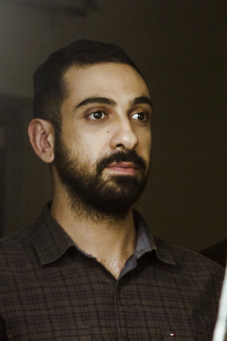 Portrait of Pouyan Fereidooni